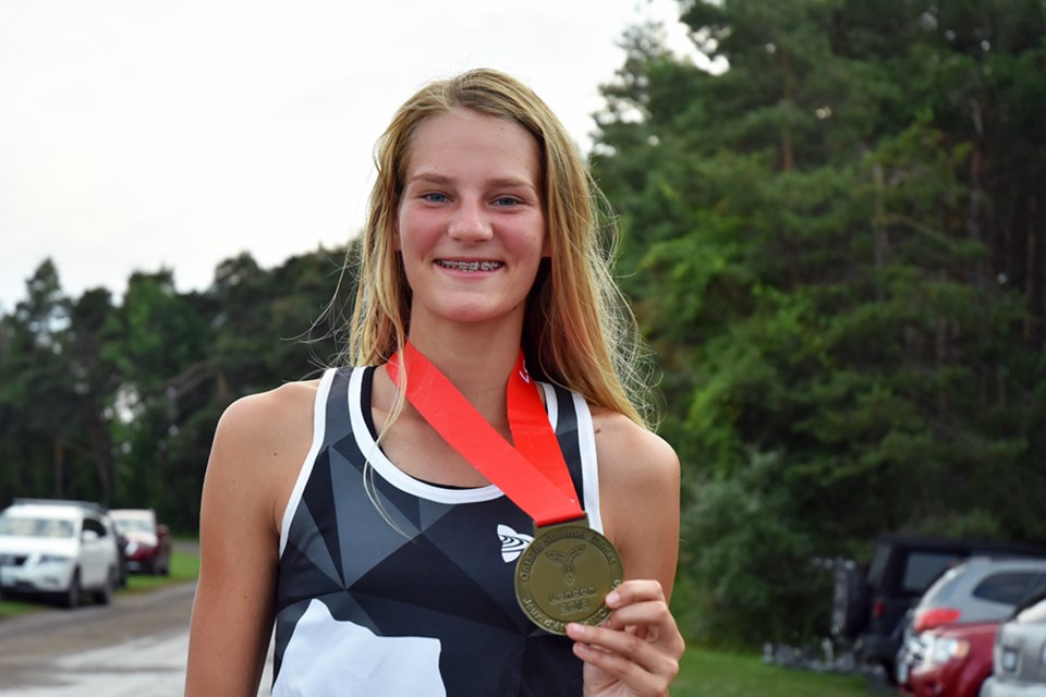 Abby Weening wears the gold medal she helped Team Ontario East win at the Ontario Summer Games in London this month. Miriam King/BradfordToday