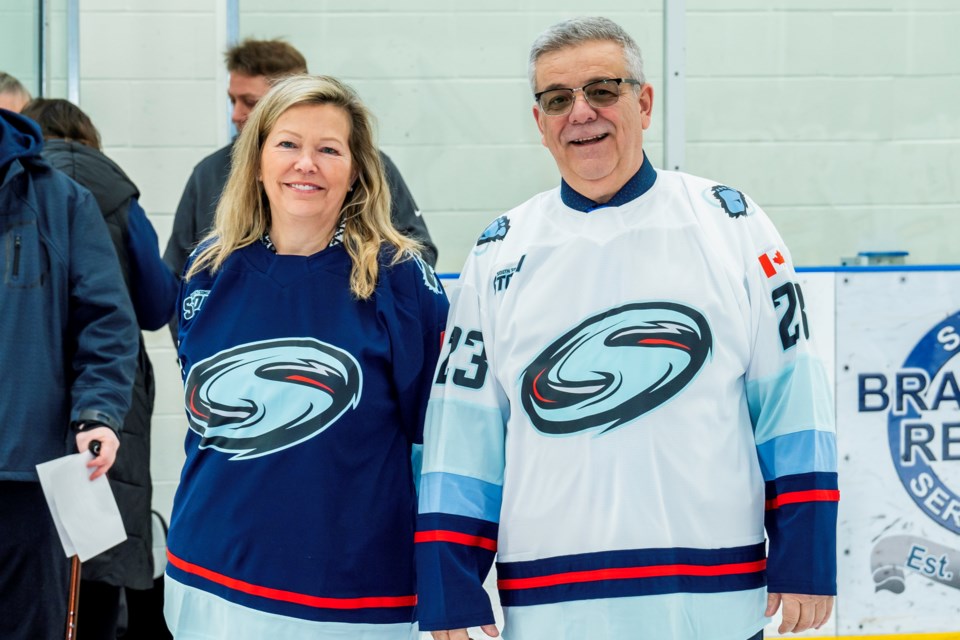 Innisfil Mayor Lynn Dollin and Bradford Mayor James Leduc showing off the new South Simcoe Storm logo and jerseys. Paul Novosad for Bradford Today.