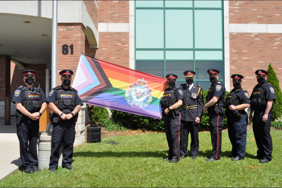 Members of the South Simcoe Police along with Chief Andrew Fletcher and members of the Diversity, Equity, and Inclusion Committee raised the rainbow flag in honor of Pride month.