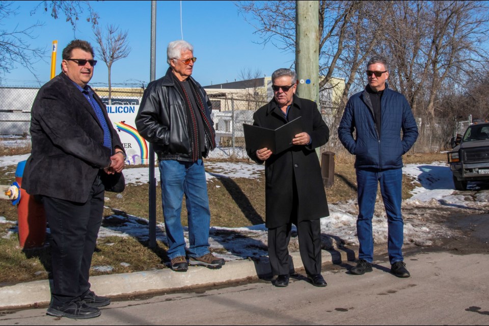 Mayor James Leduc congratulates father and son Nino and Tony Tomizza on their many years of success in business and their contributions to Bradford. Paul Novosad for Bradford Today.