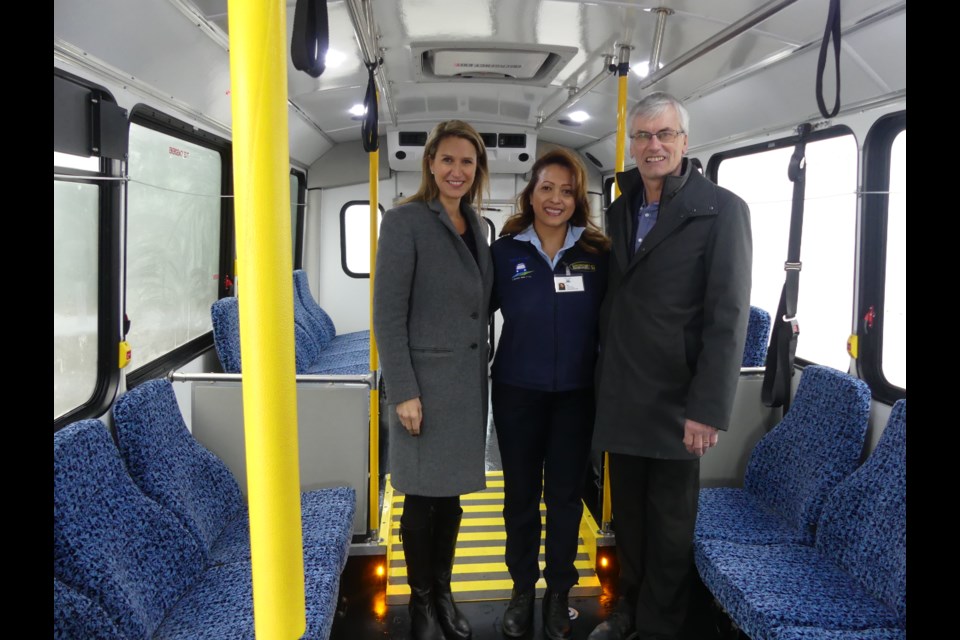 York-Simcoe MPP Caroline Mulroney, from left, BWG Transit bus driver Tina Oliviera, and Mayor Rob Keffer in a BWG Transit bus. Jenni Dunning/BradfordToday