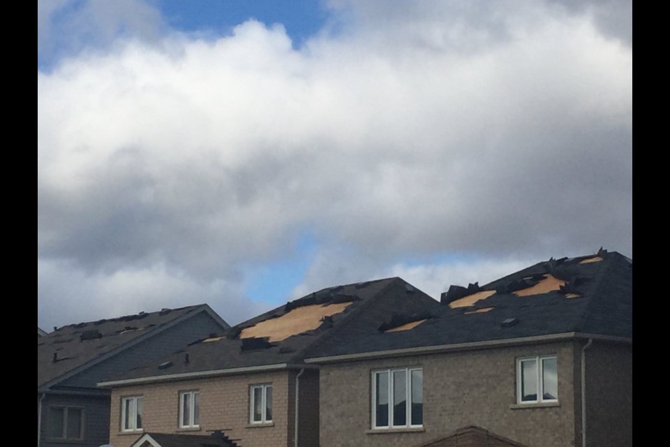 Bradford West Gwillimbury Coun. Raj Sandhu tweeted this photo of some homes on Gwillimbury Drive where shingles flew off houses in the high winds. 