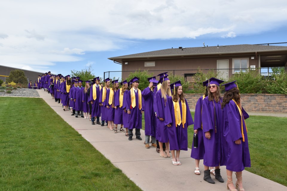 Holy Family High School's Class of 2022 lines up for commencement on Thursday in Broomfield.