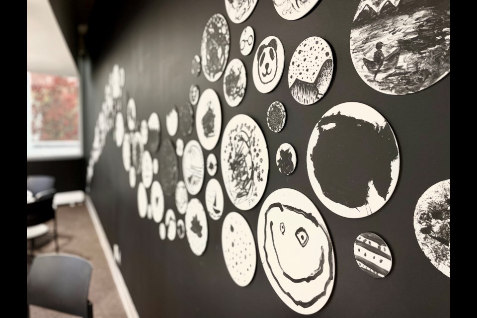 The 150 circular paintings mark the BPL's 150th anniversary.