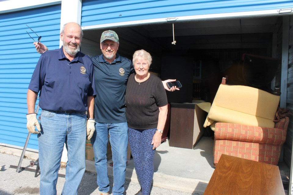 Rotary Burlington North Furniture Project volunteers (left to right) Bill Leggitt, Clinton Howell and Linda Howell pose with some of the items donated by Burlington residents on a recent pickup day. All furniture will be provided to individuals and families in need.