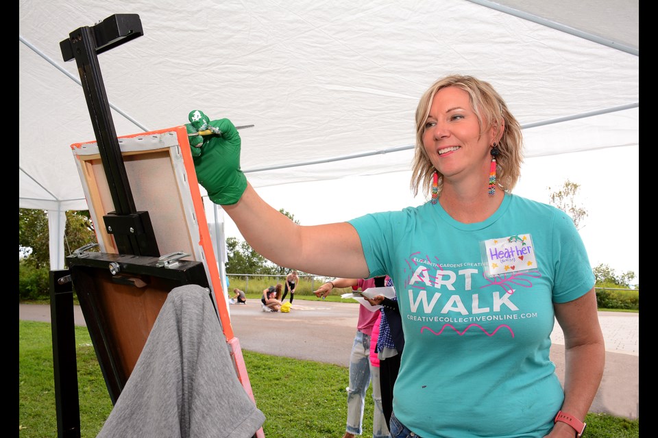 Heather de Haan leads a painting demo during the 2023 Burlington Art Walk Saturday afternoon.