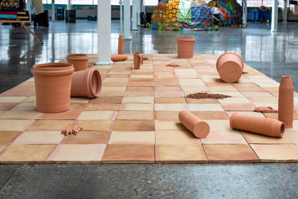 Dana Prieto's Footnotes for an Arsenal (2022), made of terracotta tiles, terracotta containers and fired soil is featured in the AGB spring exhibition, How Can I Know You?