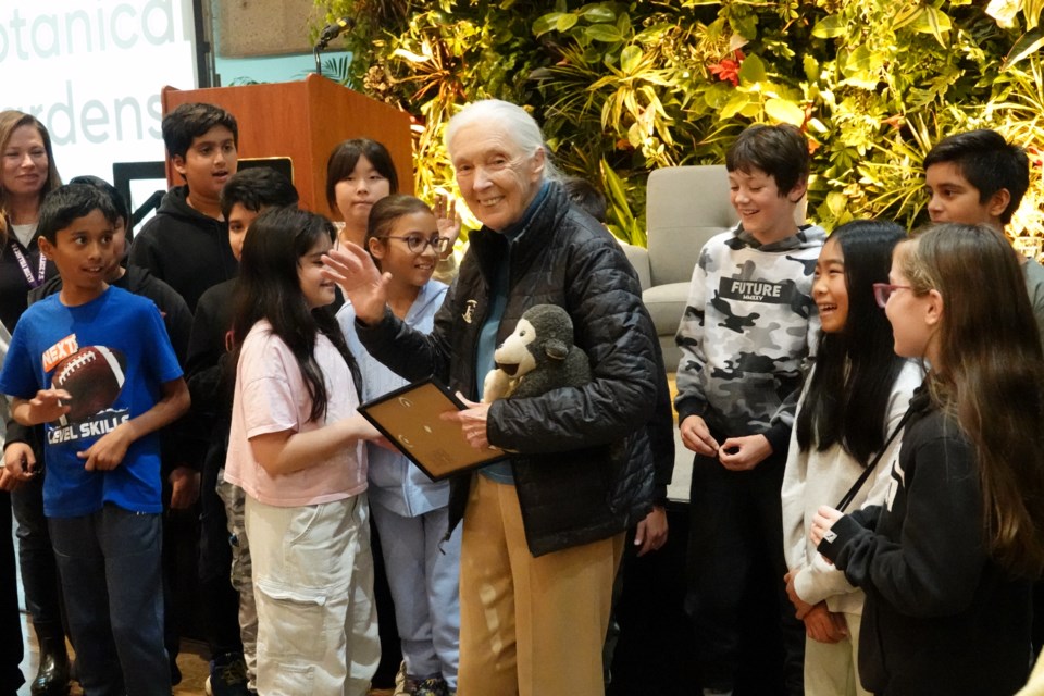 Dr. Jane Goodall spoke to 400 students at the Royal Botanical Gardens this morning. Here, students from Alton Village Public School crowd around her after her talk.