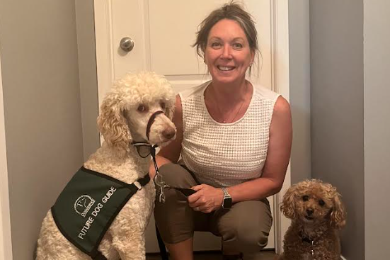 ElderDogs Canada recognizes the connection between older adults and their dogs. Here, Halton pawd leader Terri Hall with her two dogs:  Zack, a  Guide Dogs of Canada trainee, and Cocoa, a St. John Ambulance Therapy Dog.
