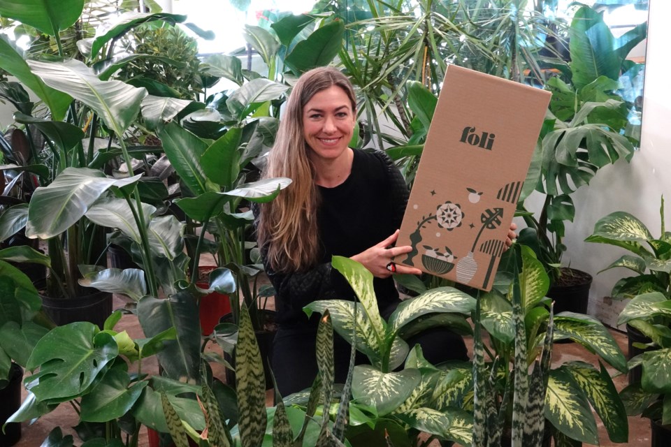 Foli owner Emily Wight with some of the plants she ships across Canada.