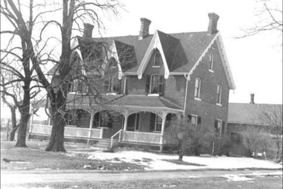 The Joseph Freeman homestead on the north side of Plains Road, west of Brant Street, ca 1950s. The property was sold to Holland Motors.