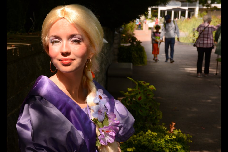 Rapunzel was just one of the fairy-tale characters to greet visitors at the Telling Tales Festival at RBG Saturday. Belle, Snow White and Little Red Riding Hood  were also wandering the park and engaging with youngsters.