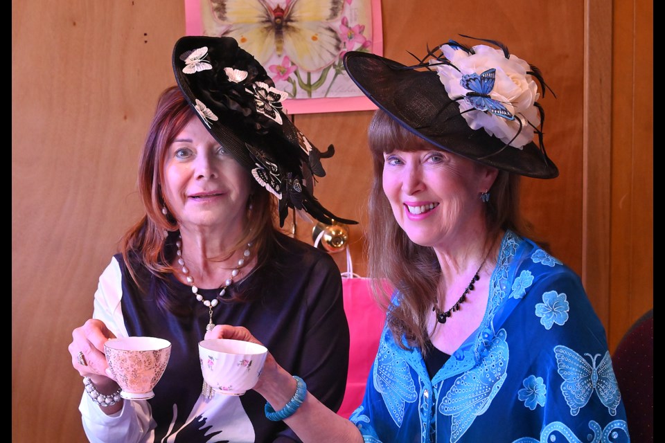 Appleby United Church held its butterfly tea with a best hat competition. Here, Pat DaCosta and Sandy May show off their hats.