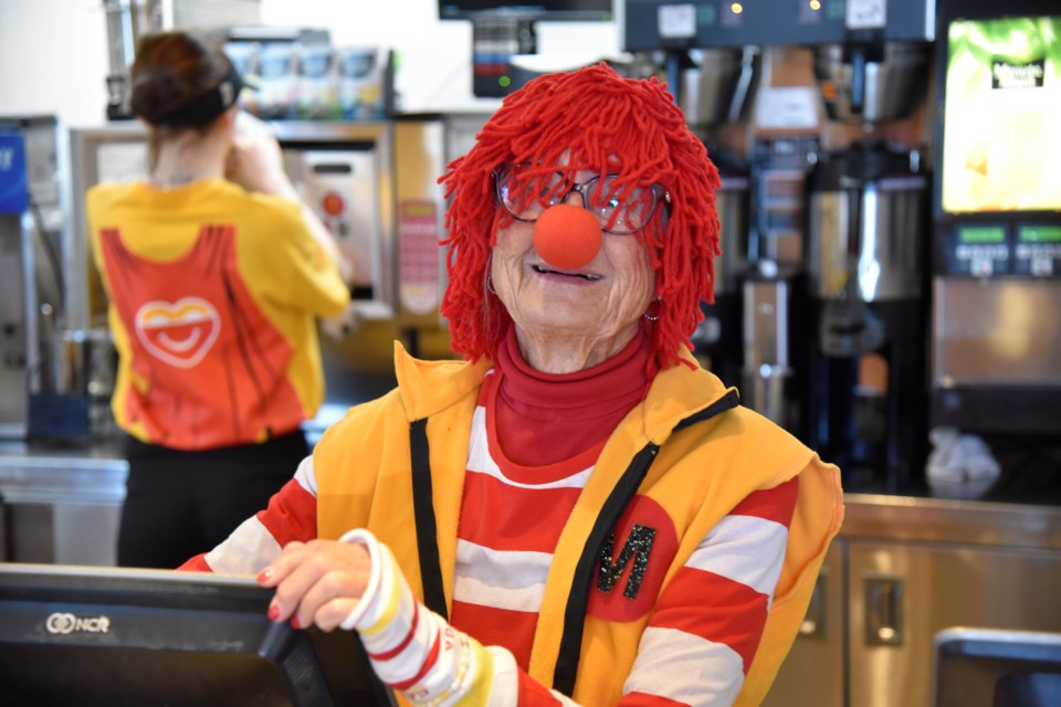 Colleen Van Horn went all-out to dress up as Ronald McDonald while serving customers on McHappy Day.