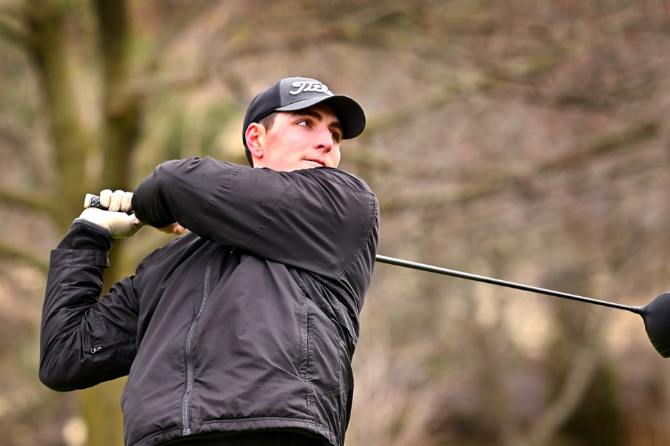 Tyandaga Golf Course opened up the greens and it was a steady stream of duffers shaking off the cobwebs and polishing their clubs Saturday despite the threatening clouds, a mix if sleet and hail at the noon-hour, and chilly temperatures. Evan Saap teeing off 