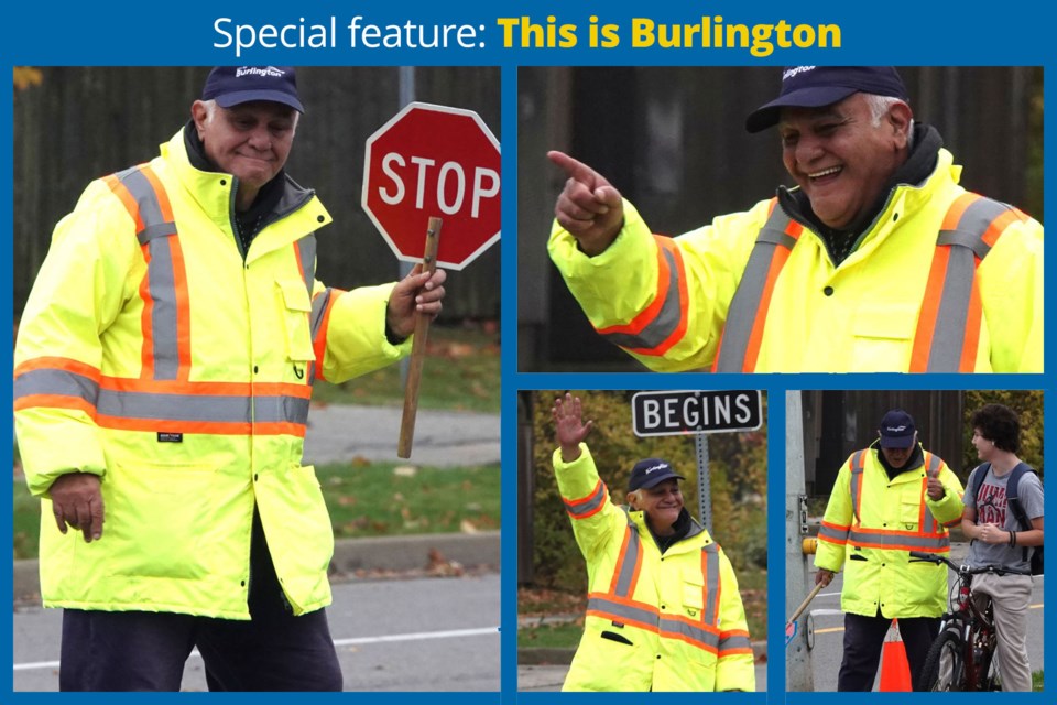 Alejandro Medina, in action at the corner of Brant and Havendale where he works as a crossing guard.
