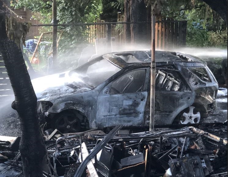 A suspicious car fire in lower Sapperton on July 14 spread to Lorrie Williams garage, shed and fence.