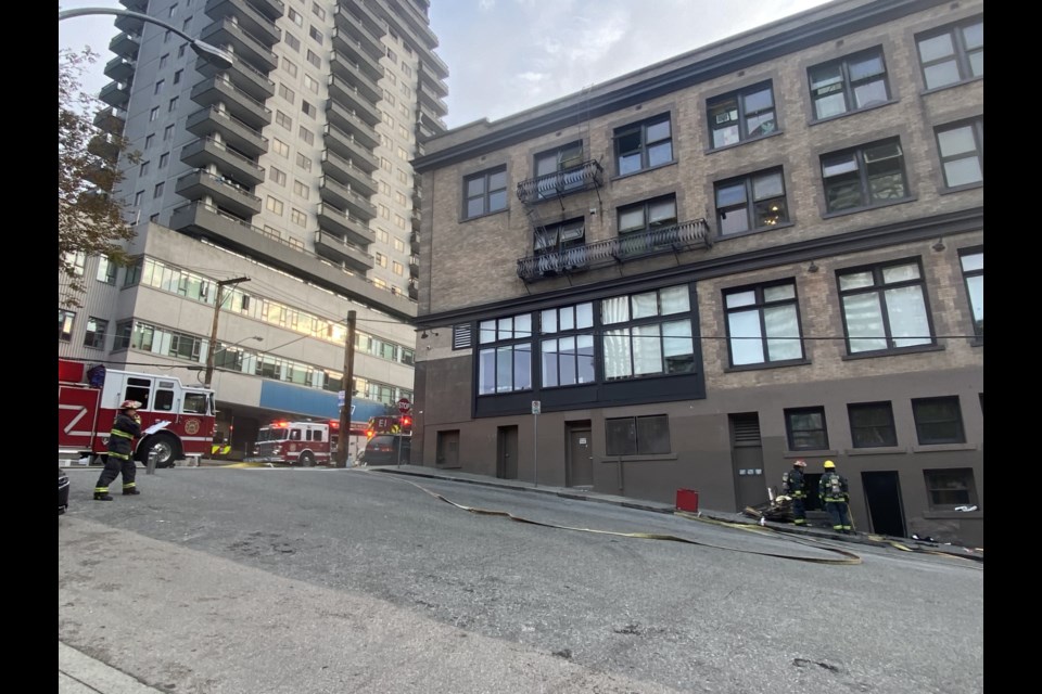 Fire alarms were ringing inside a building at 640 Carnarvon St. after a small fire was reported inside the building Wednesday morning.