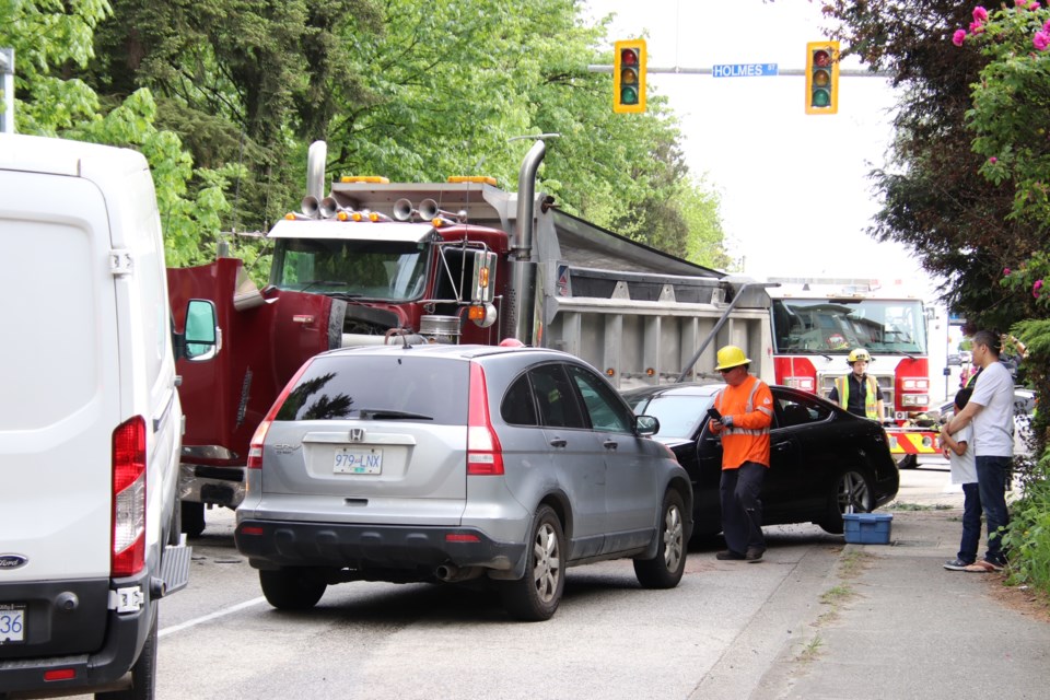 A dump truck struck a pole and collided with a vehicle near Hume Park on Tuesday afternoon.