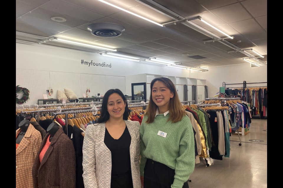 Nancy Wingham of Nuez Acres and  Sarah Chew of the UGM invite folks to shop at Found Thrift Boutique.