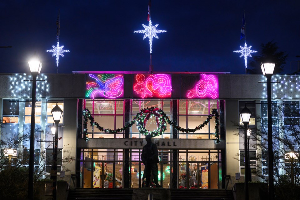 The Friction Ridge public art installation is currently flanked by holiday lights on New Westminster City hall. 