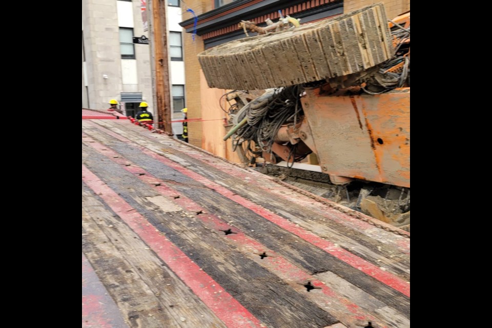 Drilling equipment fell off a flatbed truck on Wednesday afternoon near a downtown New West construction site. 