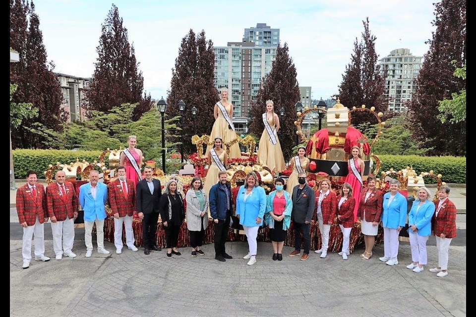Members of city council joined Hyack representatives in front of this year's float at city hall on May 9, when the city proclaimed May 28 as Hyack International Parade and Festival. Contributed