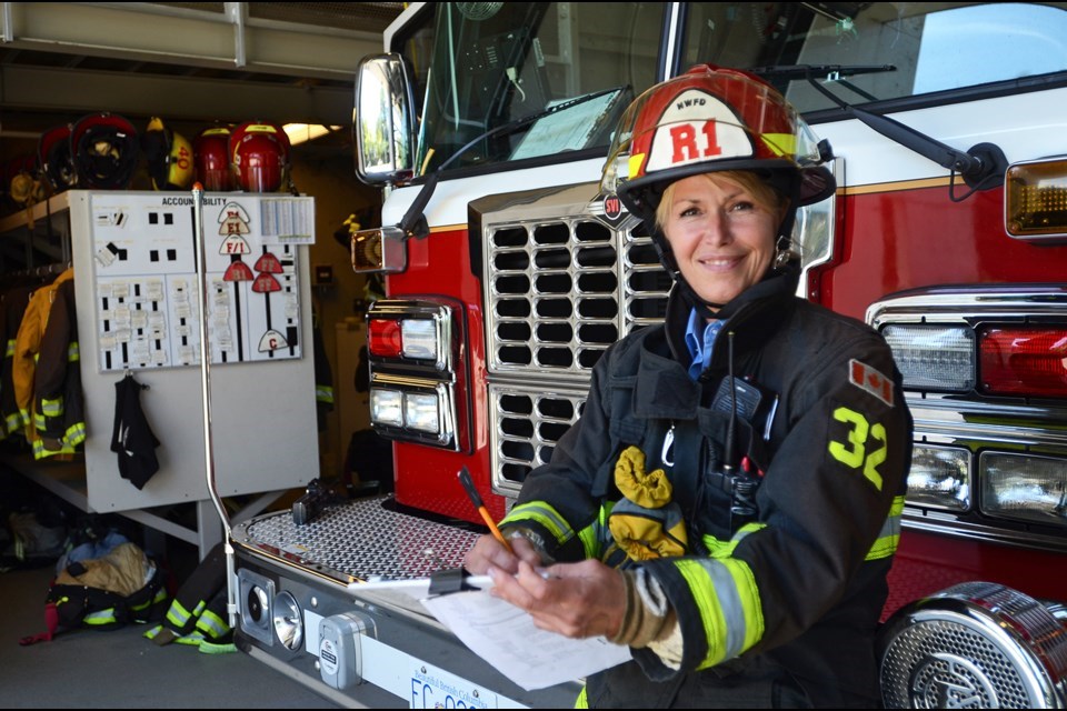 Kathy Ius, now a training captain with New Westminster Fire and Rescue Service, became the city's first woman firefighter in 2001.