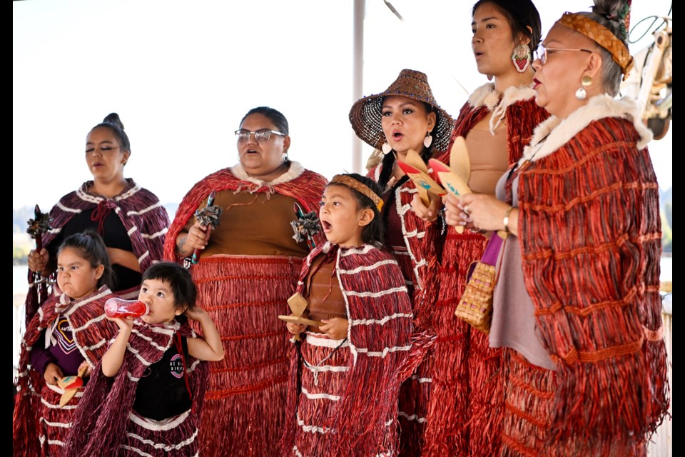 Tsatsu Stalqayu (Coastal Wolf Pack) perform traditional Salish song and dance at RiverFest on Saturday at Westminster Quay.