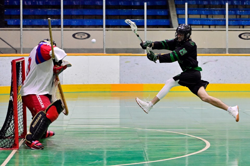 Salmonbellies goalie Zach Higgins faces a shot from Lakers' Nick Jensen in a June 2 game at Queen's Park Arena.