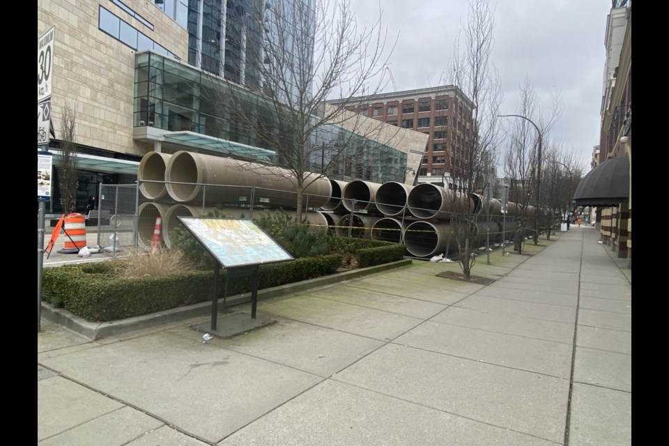 City council is concerned that the pile of sewer pipes on Columbia Street are impacting local businesses.