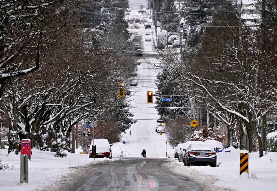 snow-in-new-west-cyclist