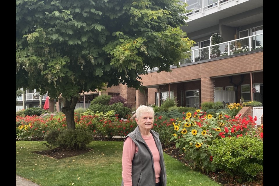 Pat Cutshall is one of the Dockside residents whose views of the Fraser River and lighting is impacted by three trees on the riverfront.