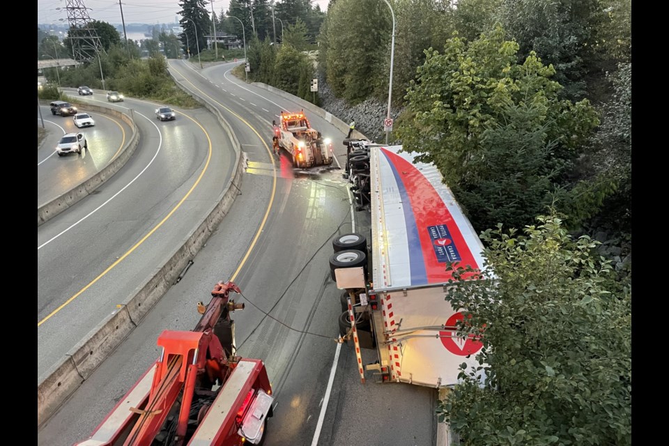 A toppled truck stalled traffic in New Westminster on Sunday night.