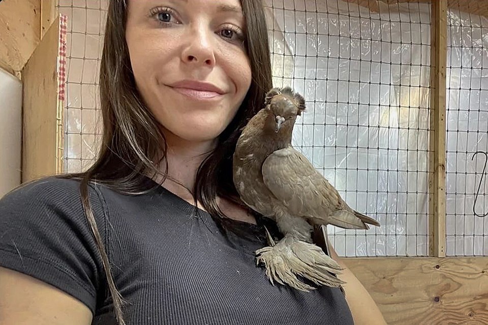 Chrissy Chin poses with Pidgey at her Aldergrove farm. The fancy bird had been abandoned at Burnaby's Central Park.