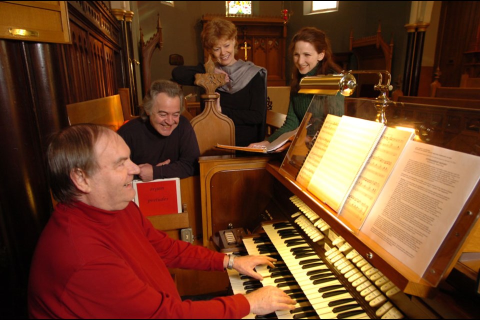 Music director George Ryan, actors Russell Roberts and Colleen Winton, and director Renee Bucciarelli in rehearsal for City Stage New West's first production, a staged reading of T.S. Eliot's Murder in the Cathedral in 2008.