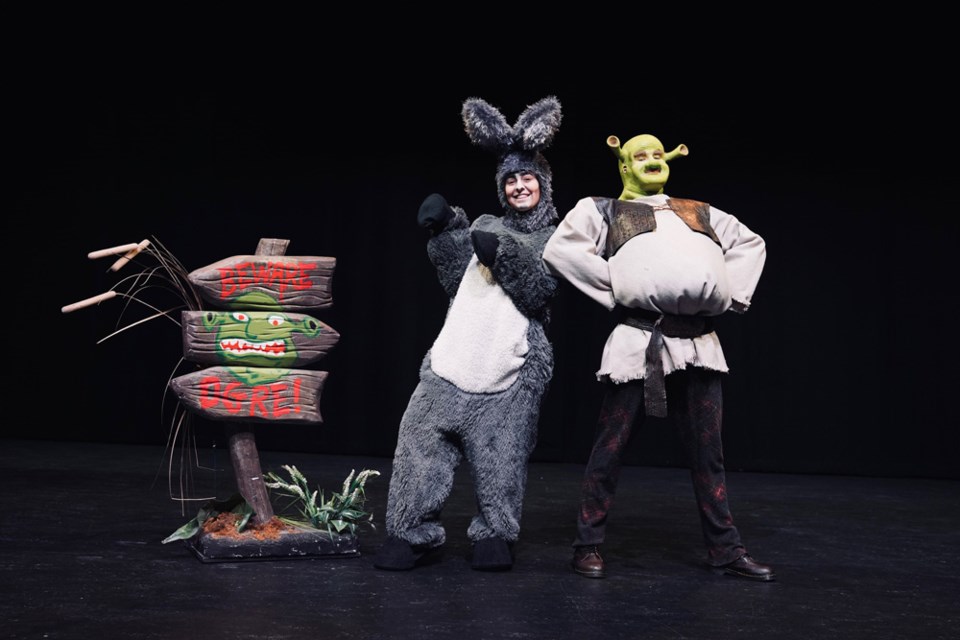 Shantei Leal is Donkey and Rebecca Vander Zalm is Shrek in the New Westminster Secondary School production of Shrek the Musical, onstage March 1 to 4 at Massey Theatre.