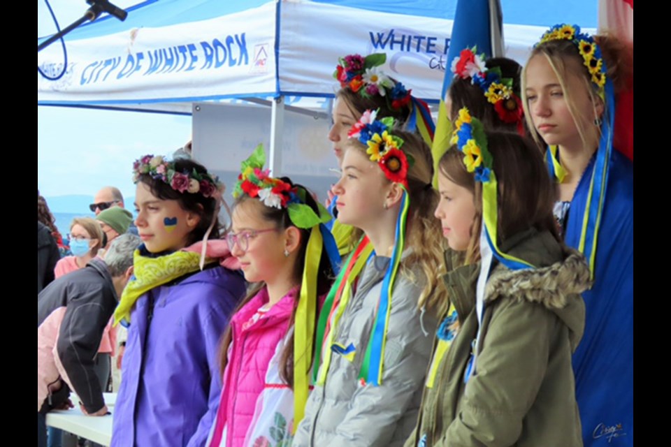 The Spivanochka Ukrainian Children’s Choir performs as part of a Ring Out for Ukraine benefit concert at Queens Avenue United Church on Thursday, June 23.