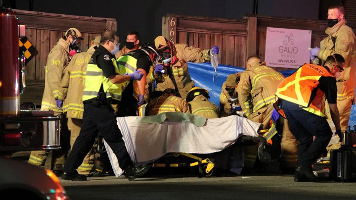 Burnaby firefighters worked feverishly in an attempt to save the life of a motorcyclist who was seriously injured Saturday night in a possible hit-and-run incident.