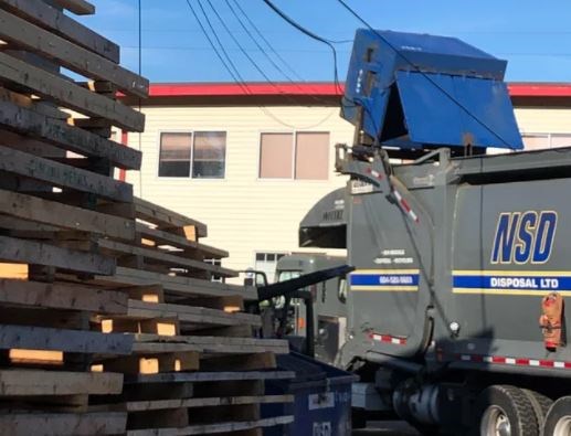 A photo on Reddit by Scotchhappy shows a waste disposal truck tangled up in some power lines. According to a power outage map from BC Hydro, homes without power at just east of Boundary Road at Kitchener Street.