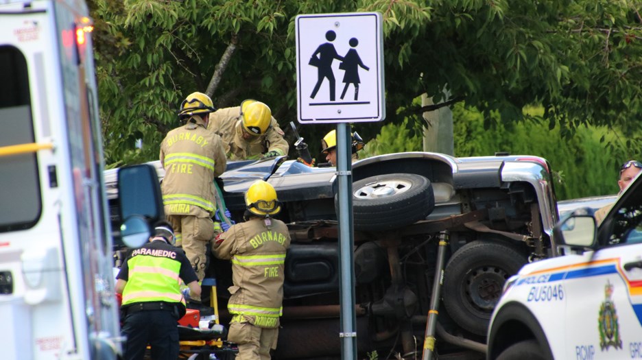 Burnaby firefighters, police and paramedics are on scene on Duthie Avenue at Montecito Drive in front of Montecito Elementary for a crash involving two pick-up trucks.