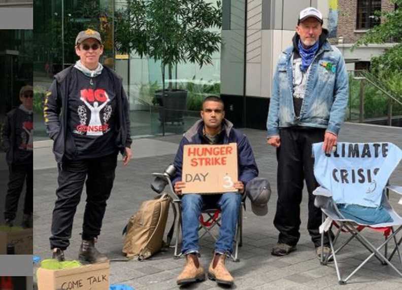 Brent Eichler, president of Unifor local 950, Zain Haq (centre), a 20-year-old student at SFU and Evie Mandel, a 65-year-old retired CPA and former staff member at the World Health Organization had been on a hunger strike for seven days outside 401 Burrard St.