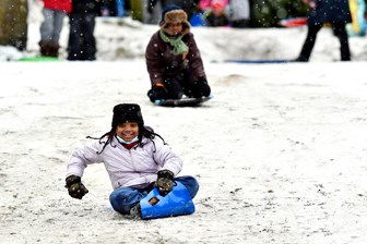 Sophia Damonse, 9, slides down the hill in Queen's park.
Photo: Jennifer Gauthier