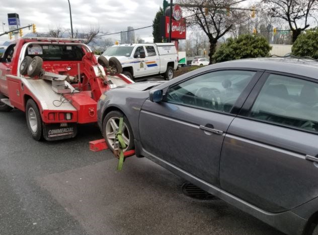 rcmp distracted driving towed arrested
