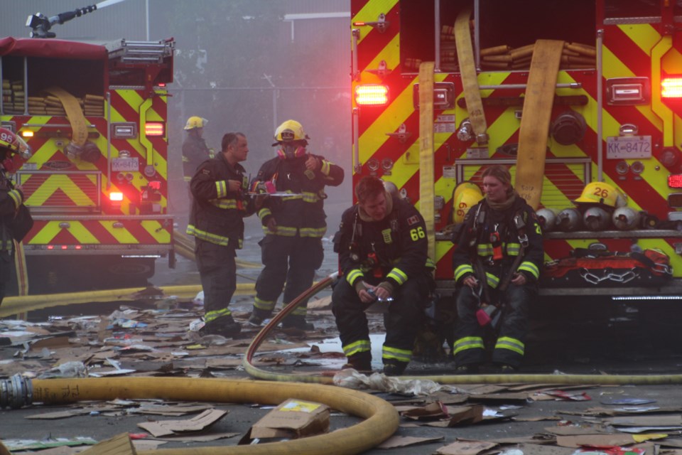 Fire crews got a blaze at a New West recycling facility under control.