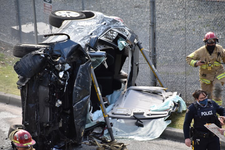 It was 2:15 p.m. on Monday when a driver went down a dead-end laneway in a housing complex east of Sperling Avenue. The driver then drove through a pedestrian walkway, through a fence and plunged about 50 feet down and across the road before ending up on its side.