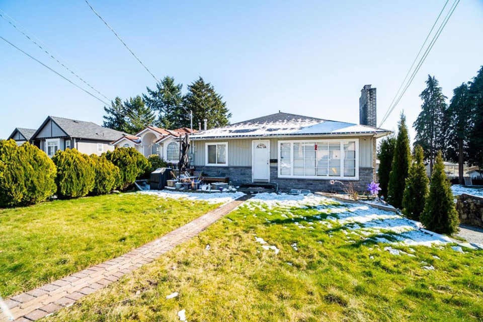 A house on 13th Avenue in Burnaby just sold and it had an outrageous glow-in-the-dark orange bathroom featured in the listing photos.