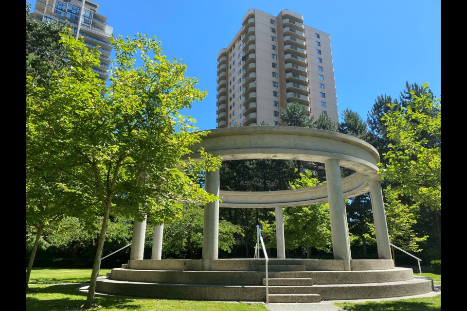 The Post 83 Housing Co-op rises above Mayberry Street, the land now owned by the City of Burnaby.