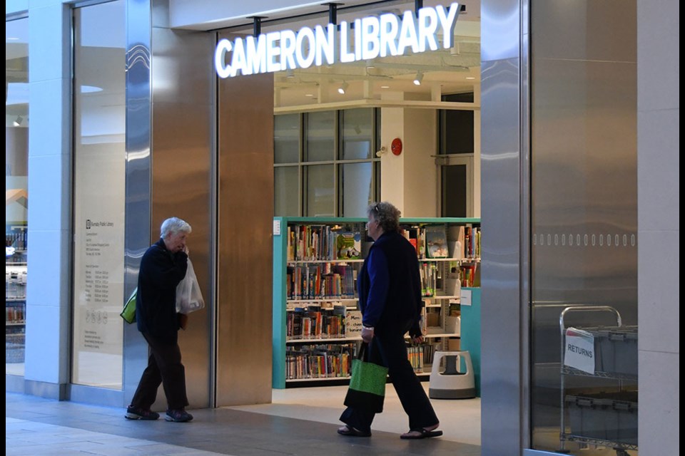 Guests are quickly finding the new Cameron Library in Lougheed shopping centre.