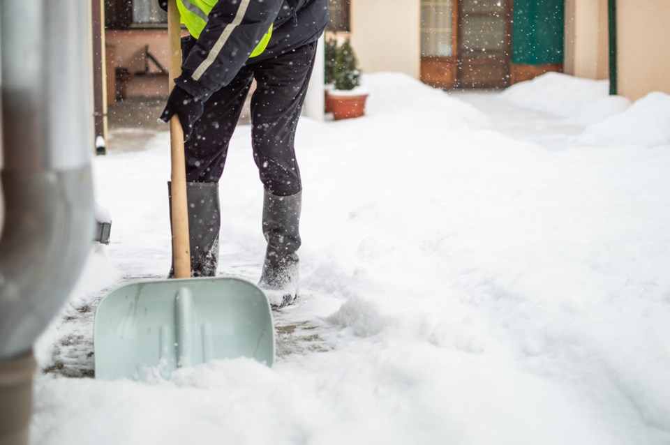 snow shovel shoveling shovelling